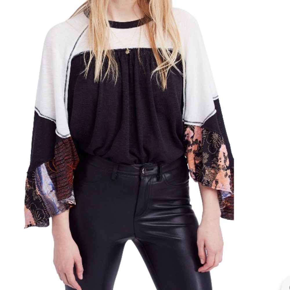 NWOT Free People “Friday Fever”  mixed pattern bat wing top oversized Small